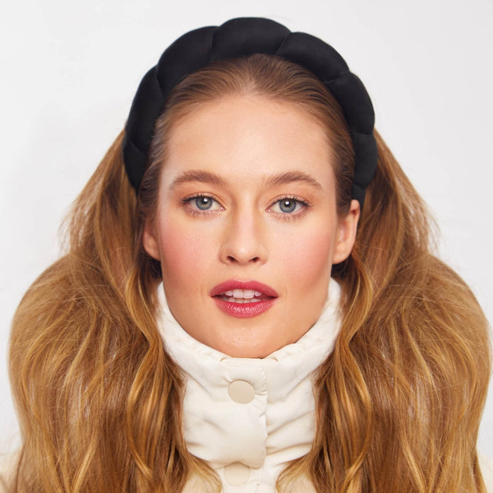 Recycled fabric puffy headband in black color, showcasing a stylish and eco-friendly design